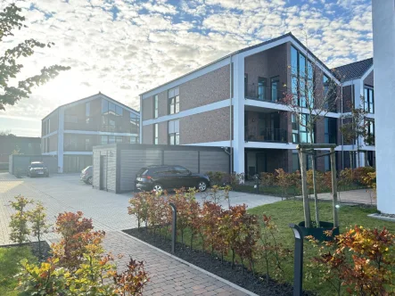 Ansicht - Wohnung kaufen in Norden - Tolle kleine Neubauwohnung mit Blick auf die Mühle in Norden! KfW 40 & Erdwärme!