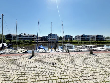 Gesamtansicht - Wohnung kaufen in Norden - Sonnige Erdgeschosswohnung am Norder Tor mit großer Terrasse *KfW 40*