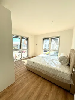 Schlafzimmer 1 - Wohnung kaufen in Dahme - Sonnige 3-Zimmer-Wohnung mit Meerblick