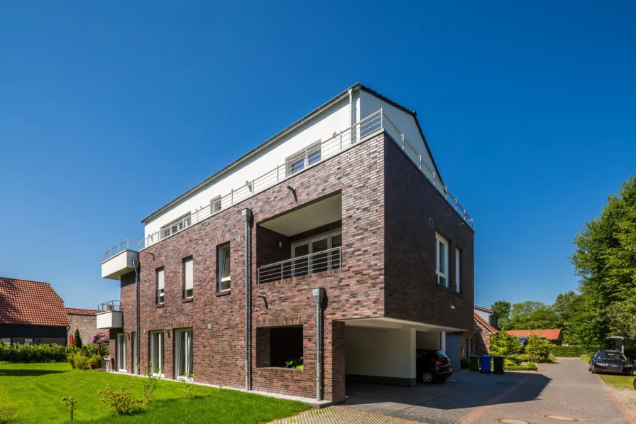 Außenansicht - Wohnung kaufen in Oldenburg - Eigentumswohnung im Obergeschoss mit Loggia und Blick ins Grüne zu verkaufen!