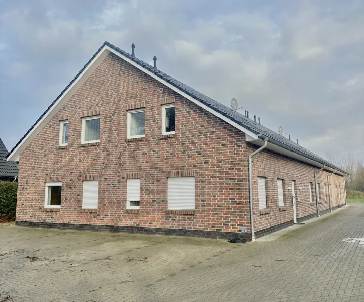 Außenansicht - Wohnung mieten in Papenburg - Attraktive Erdgeschosswohnung am Obenende!