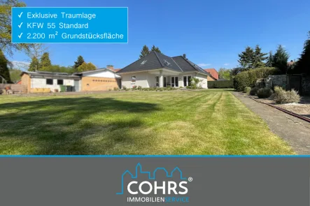 Außenansicht Gartenseite - Haus kaufen in Schwarmstedt - Für allerhöchste Wohnansprüche: Solider Bungalow auf 1,5 Etagen mit KFW 55-Standart!