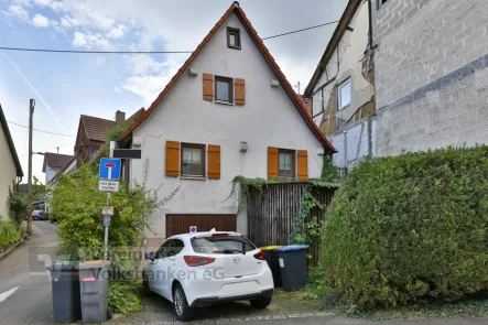 Aussen - Haus kaufen in Reutlingen / Ohmenhausen - kleines Einfamilienhäuschen mit Garage und kleinem Garten.