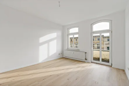 Schlafzimmer - Wohnung mieten in Halle - Sanierte 4-Raumwohnung mit Balkon in der Torstraße!