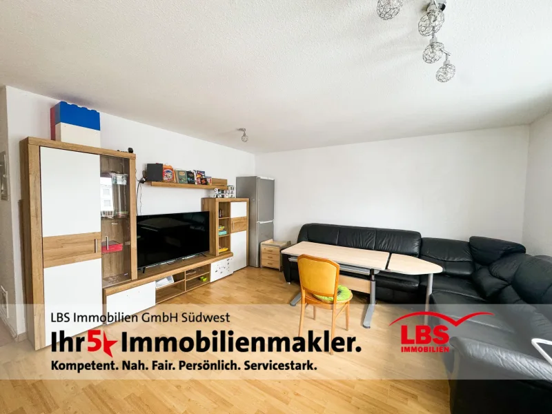 Wohnzimmer - Wohnung kaufen in Weil am Rhein - Großzügige 5-Zimmer-Wohnung in ruhiger Lage von Weil am Rhein - Friedlingen 