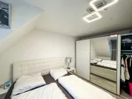 Wohnung DG Schlafzimmer