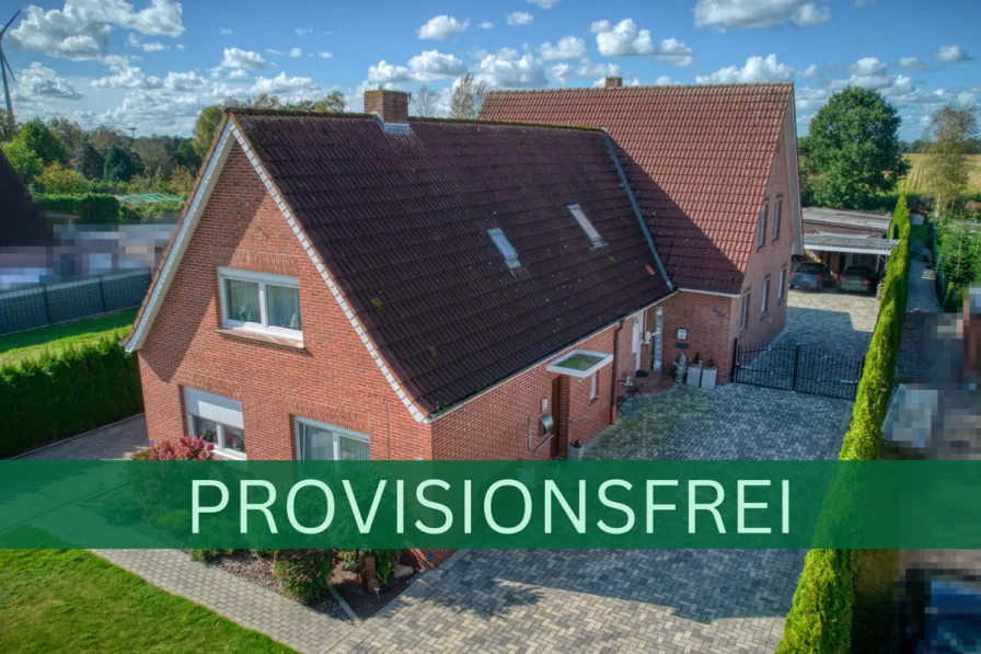 FRONTANSICHT - Haus kaufen in Rhauderfehn - 2 HÄUSER 1 PREIS - IDEAL ALS MEHRGENERATIONENHAUS IN LÄNDLICHER LAGE