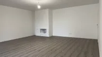 Wohnzimmer mit Kamin