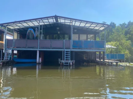 Bootshaus in Mirow - Haus kaufen in Mirow - gepflegtes Bootshaus mit Motorboot an der Müritz-Havel Wasserstraße