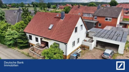 Nordseite - Haus kaufen in Neustadt - Einzigartige Wohngelegenheit in Helstorf – Einfamilienhaus mit großer Garage für vier Autos