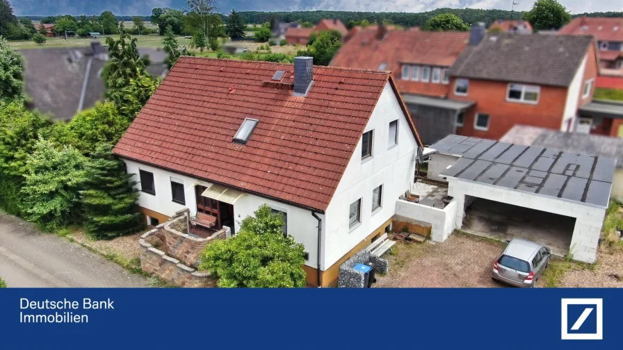 Nordseite - Haus kaufen in Neustadt - Einzigartige Wohngelegenheit in Helstorf – Einfamilienhaus mit großer Garage für vier Autos