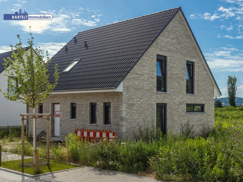 6 - Haus kaufen in Pattensen / Schulenburg - Neubau: Nachhaltiges Wohnen mit historischem Ausblick!