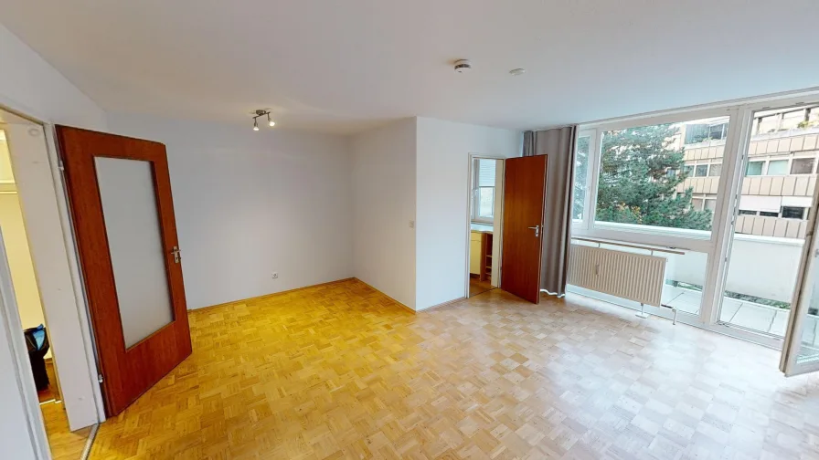 Wohnraum - Wohnung kaufen in München - Bezugsfreie 1,5 Zimmer Wohnung mit Balkon und Tfg Stellplatz