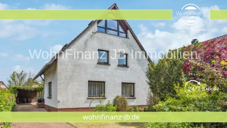 Hausansicht vorn - Haus kaufen in Schwülper / Groß Schwülper - Einfamilienhaus mit schönem, großem Garten - Sauna, Keller und ausgebautem Spitzboden