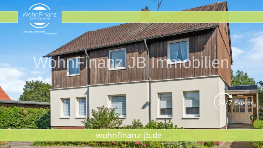 Straßenansicht - Haus kaufen in Wolfsburg / Neindorf - Zweifamilienhaus mit weitläufigem Garten und vielfältigem Gestaltungspotential