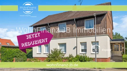 Titelbild - Haus kaufen in Wolfsburg / Neindorf - Zweifamilienhaus mit weitläufigem Garten und vielfältigem Gestaltungspotential