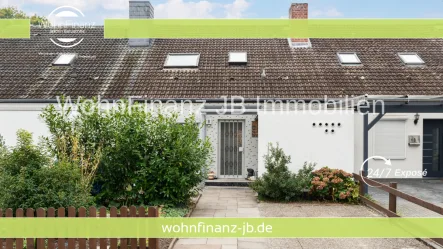 Straßenansicht - Haus kaufen in Gifhorn - Attraktives Reihenmittelhaus mit gemütlichem Garten in Gifhorn Stadt