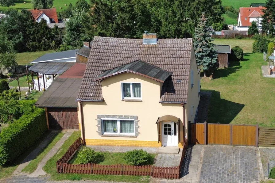 Titelbild - Haus kaufen in Zirchow - Familienidyll mit großem Grundstück, Garage und Thurbruch-Panoramablick