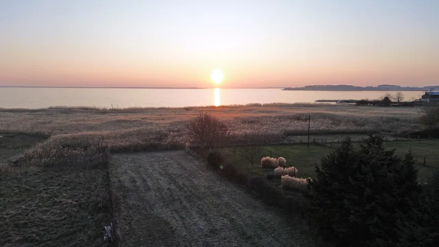 Sonnuntergang / Blick vom Grundstück