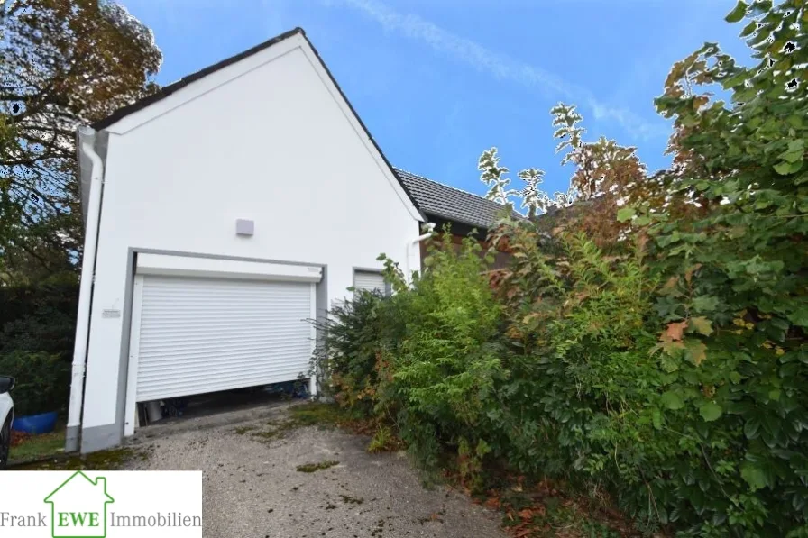 Garage, 3-Zimmer-Wohnung mit Balkon und Garage zum Kauf in Hilden, Frank Ewe Immobilienmakler Düsseldorf Hassels