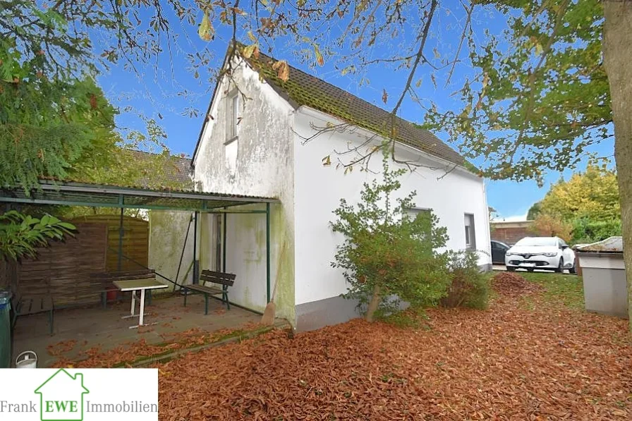 Terrasse, 3-Zimmer-Wohnung mit Balkon und Garage zum Kauf in Hilden, Frank Ewe Immobilienmakler Düsseldorf Hassels