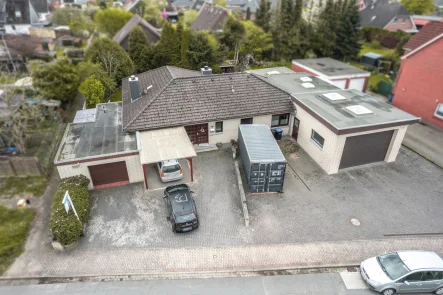 Luftaufnahme - Haus kaufen in Beverstedt - Beverstedt // Gepflegter Bungalow mit 3 Garagen für Ihr Hobby