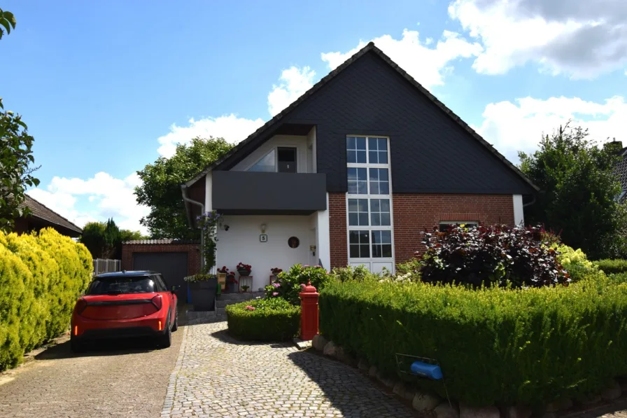 Titel - Haus kaufen in Loxstedt / Bexhövede - Loxstedt-Bexhövede // Gepflegtes Zweifamilienhaus in ruhiger Lage – Perfekt für Familien!