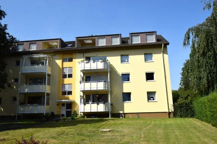 Außen - Wohnung kaufen in Bremerhaven - Bremerhaven // Geräumige 5-Zimmer-Eigentumswohnung mit Balkon und Außenstellplatz – Ideales Familienheim in gepflegter Wohnanlage