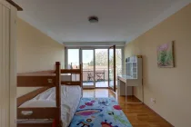 Schlafzimmer mit Ostbalkon 