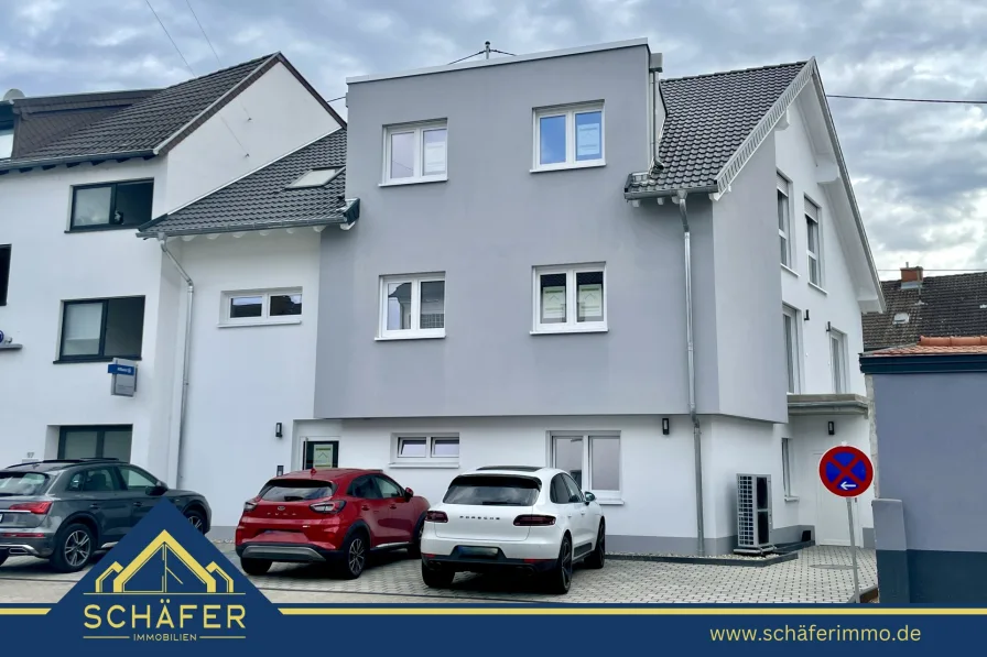 1 - Wohnung kaufen in Saarlouis - Hochwertige Neubauwohnung in zentraler Lage von Saarlouis-Lisdorf