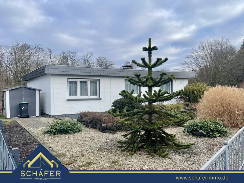 1 - Haus kaufen in Saarlouis - Charmanter Bungalow in ruhiger Lage von Saarlouis-Steinrausch zu verkaufen