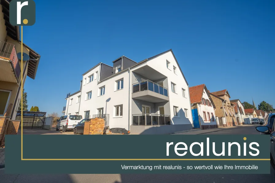 Außenansicht - Wohnung kaufen in Beindersheim - *exklusiv bei realunis* Moderne Neubauwohnung in Beindersheim – Komfortabel & Seniorengerecht