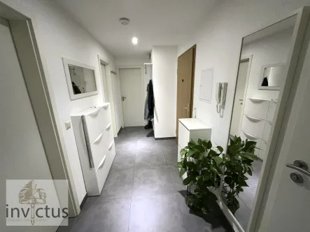  - Wohnung kaufen in Bad Rappenau / Zimmerhof - Charmante modernisierte 3-Zimmer Wohnung mit Balkon und Garage