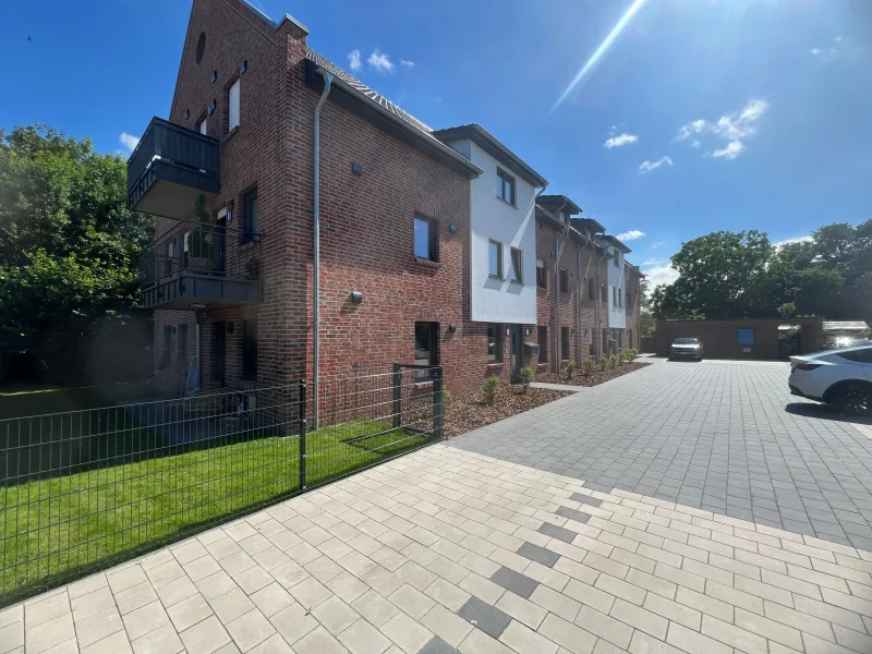 Haus - Wohnung mieten in Bunde -  Moderne Dachgeschosswohnung mit Balkon und hochwertiger Ausstattung in ruhiger Wohnlage