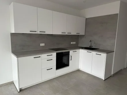 Moderne Einbauküche - Wohnung mieten in Oyten - Moderne 2-Zimmer-Obergeschosswohnung mit Balkon in reizender Lage von Oyten