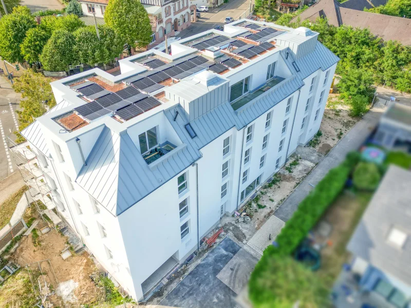 Gebäude - Wohnung kaufen in Rastatt - Neubau-Stadtwohnung mit Garten