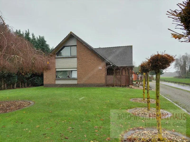 Strassenansicht - Haus kaufen in Westoverledingen / Flachsmeer - Einfamilienhaus in ländlicher Lage zwischen Leer und Papenburg