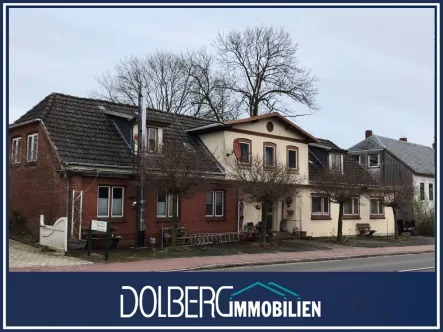 Titelbild - Haus kaufen in Hanerau-Hademarschen - Kapitalanlage - Mehrfamilienhaus mit 5 vermieteten Wohneinheiten