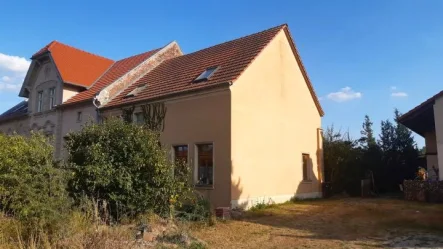 Hausansicht - Haus kaufen in Brück - Wohnen im barrierefreien EG und ausbaufähigen DG