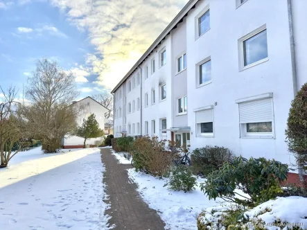 Außenansicht - Wohnung kaufen in Wedel - Solide Kapitalanlage - Vermietete 2,5 Zi.-Wohnung mit Balkon und KFZ-Stellplatz