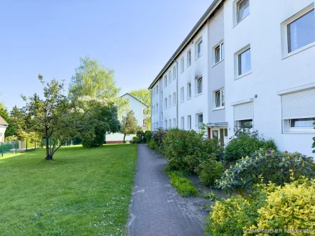 Außenansicht - Wohnung kaufen in Wedel - Solide Kapitalanlage - Vermietete 2,5 Zi.-Wohnung mit Balkon und KFZ-Stellplatz
