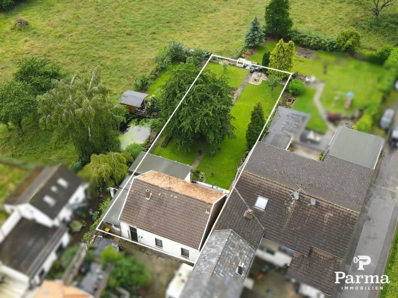 Drohnenansicht - Haus kaufen in Jülich / Merzenhausen - Einfamilienhaus mit ca. 837 m² großen Grundstück in Jülich Merzenhausen