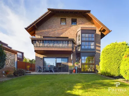 Gartenansicht - Haus kaufen in Hürtgenwald - Freistehendes Zweifamilienhaus in ruhiger Lage von Hürtgenwald-Gey