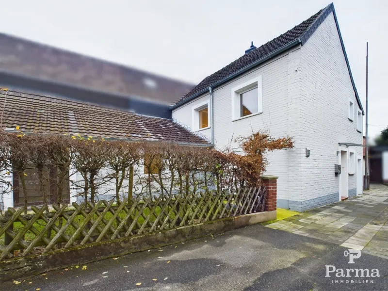 Seitenansicht - Haus kaufen in Linnich / Kofferen - Saniertes Einfamilienhaus in ländlicher Lage von Linnich