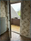 Schlafzimmer mit Balkon rechts