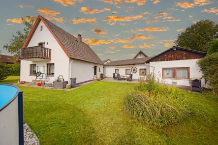 Einfamilienhaus - Haus kaufen in Geretsried - Renovierungsbedürftiges Einfamilienhaus in sonniger Lage mit Nebengebäude