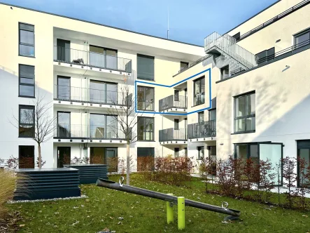 Gebäudeansicht (Innenhof) - Wohnung mieten in Wolfratshausen - Schön geschnittene 3-Zimmer Mietwohnung im Loisach Quartier