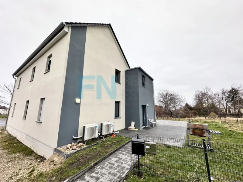 IMG_3757 - Wohnung kaufen in Schönwölkau / Gollmenz - üner 5 % Rendite +++in 2022 saniertes 2 Familienhaus mit Wärmepumpe und hochwertiger Ausstattung+++