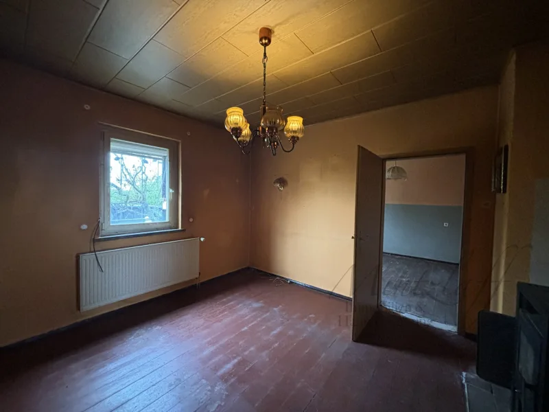 Wohnzimmer mit Kamin