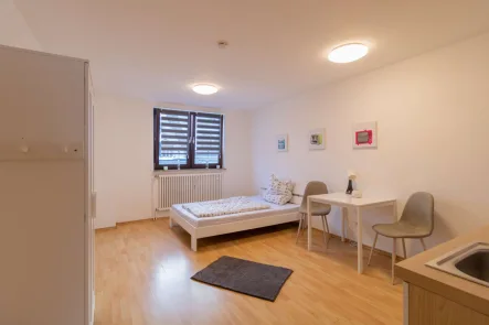 Wohn- und Schlafbereich - Wohnung mieten in Hof - VERMIETUNG (auch KURZZEITVERMIETUNG) WE-NR: 16 - MODERNE 1-ZIMMER-CITY-WOHNUNG IM HOFER ZENTRUM